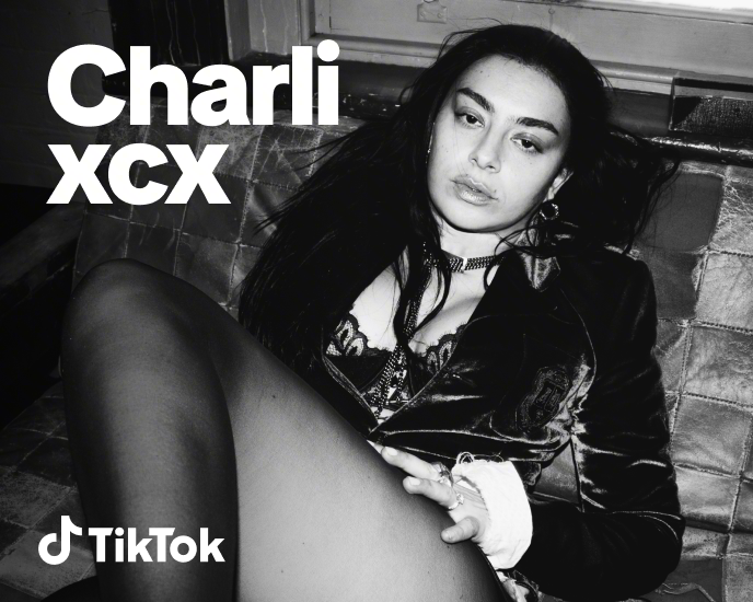 Black and white artist card for Charli XCX featuring her reclining portrait alongside the TikTok logo